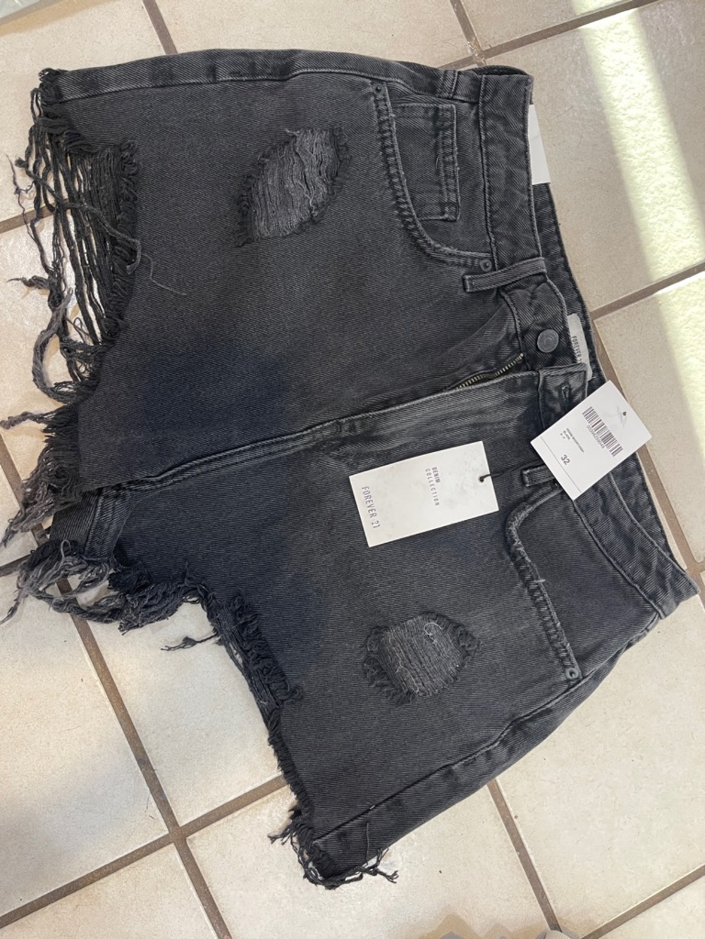 Black Distressed Denim Mini Skirt with Frayed Hem